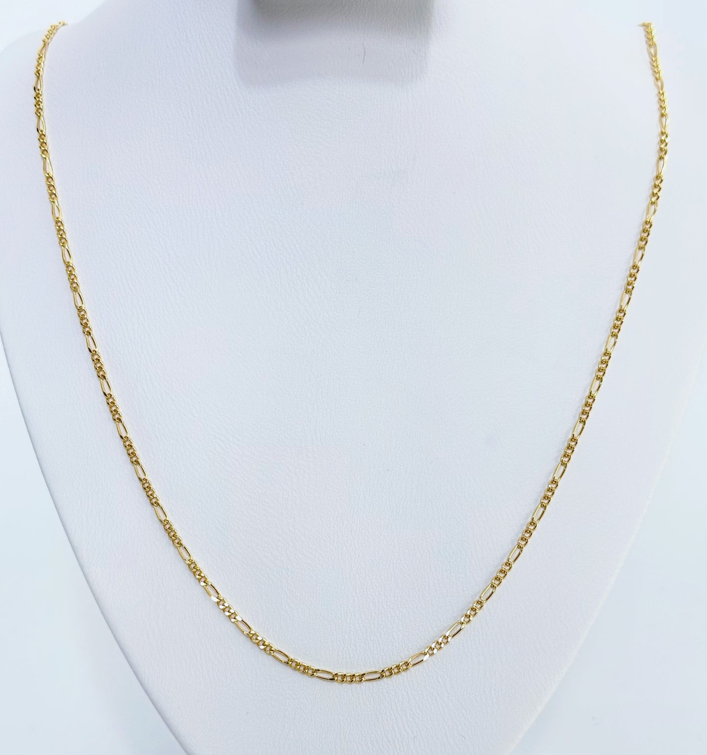 Cadena 3x1 en oro 18k