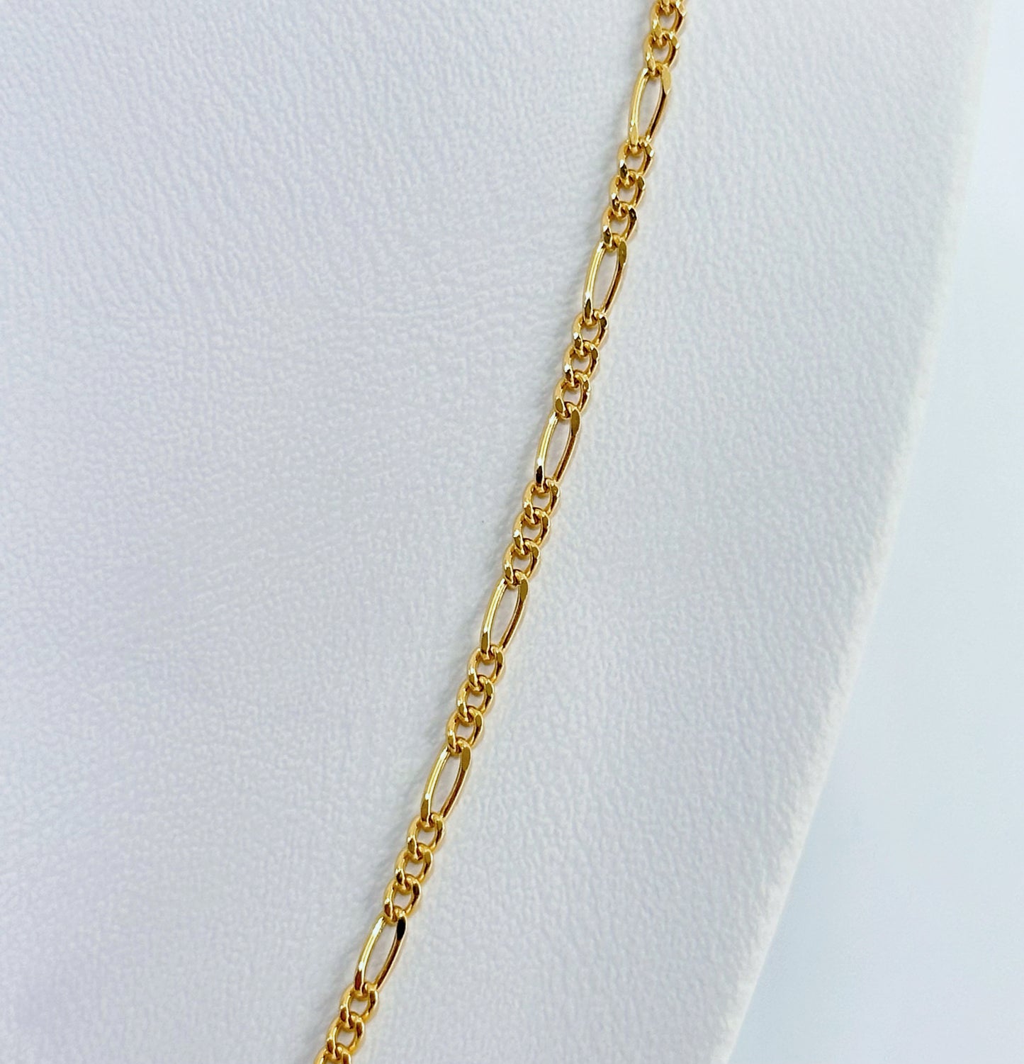Cadena 3x1 en oro 18k