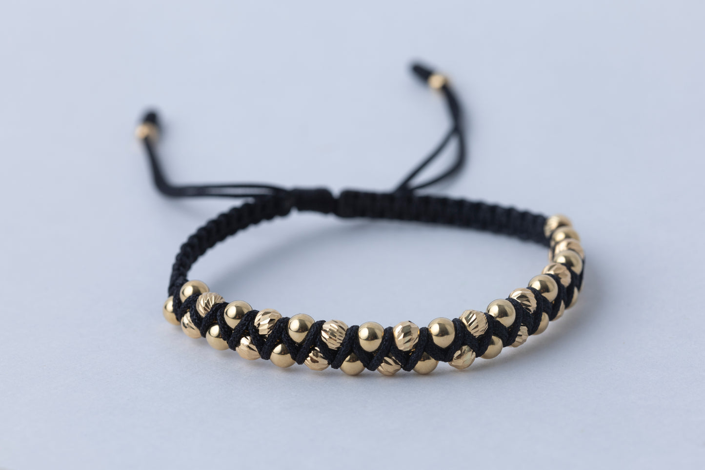 Pulsera Trenzada Negra Oro 18k
