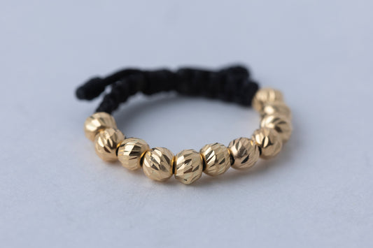 Anillo tejido balin seguido en Oro 18k