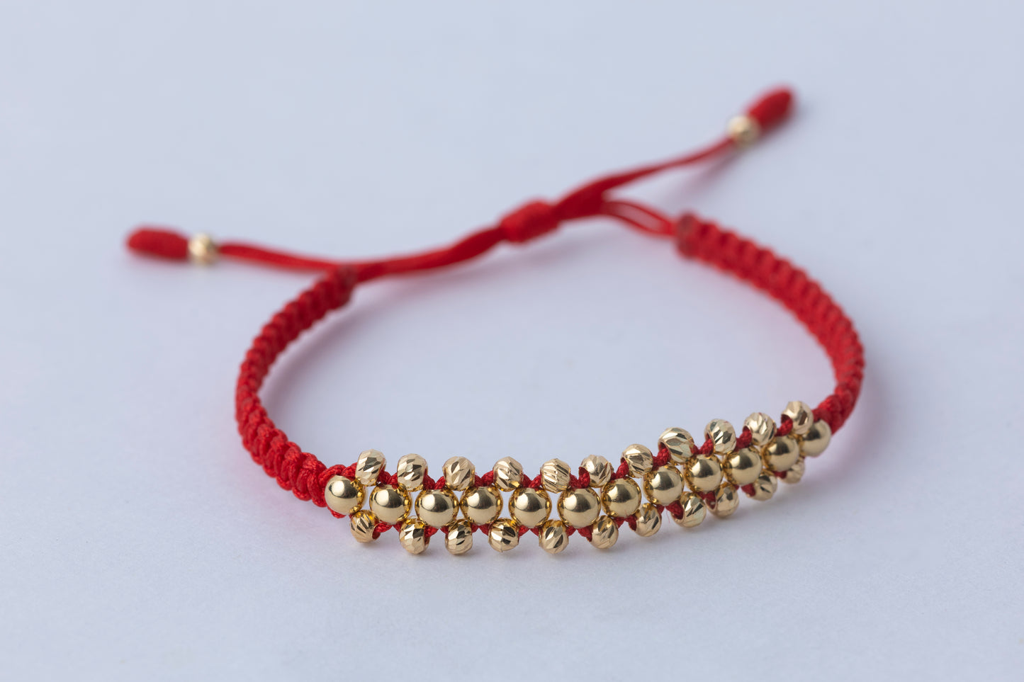 Pulso Tejido Tres Carriles Roja Oro 18k