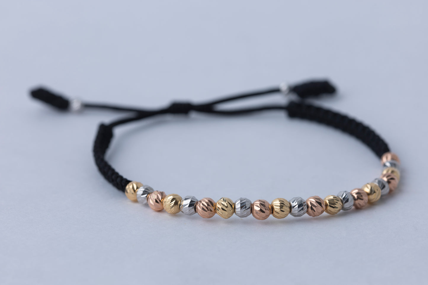 Pulso Tejido Tres Oros Balin seguido Oro 18k