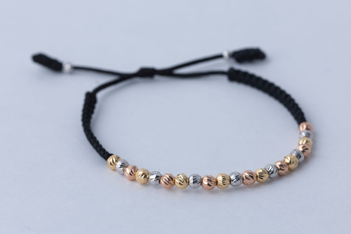 Pulso Tejido Tres Oros Balin seguido Oro 18k