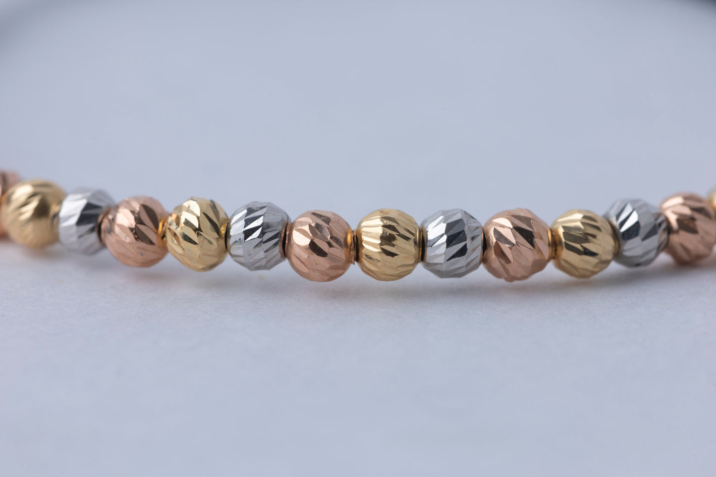 Pulso Tejido Tres Oros Balin seguido Oro 18k