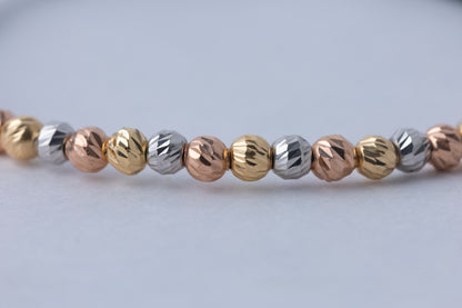 Pulso Tejido Tres Oros Balin seguido Oro 18k
