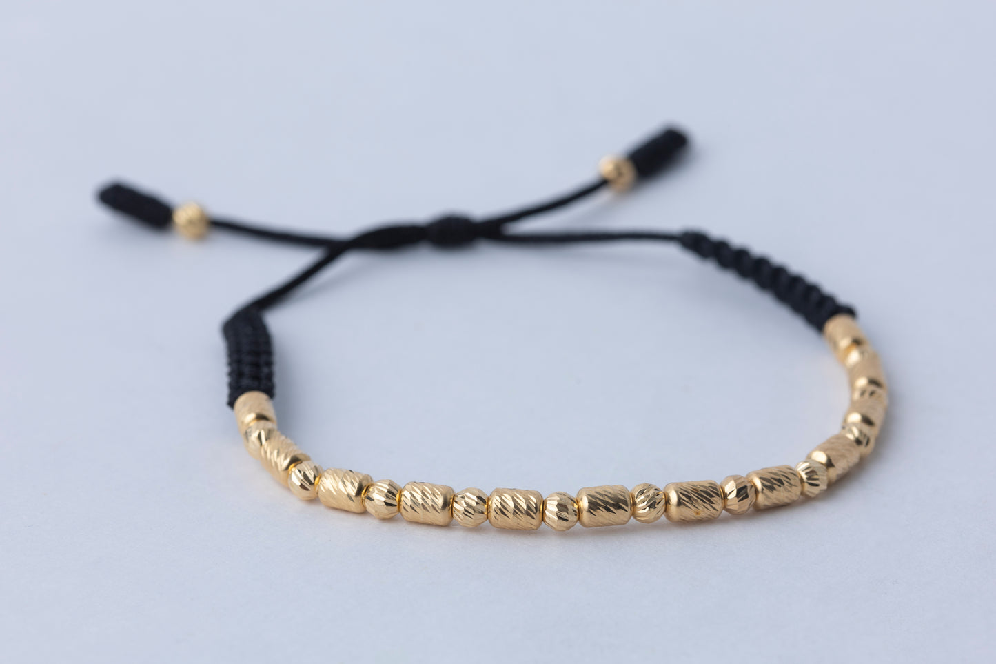 Pulso Tejido balin y barril  Oro 18K