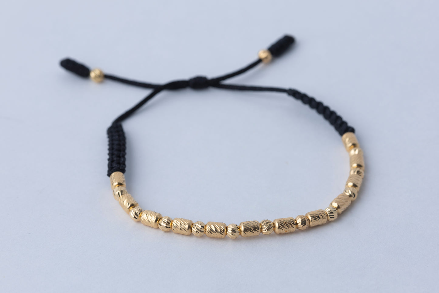Pulso Tejido balin y barril  Oro 18K