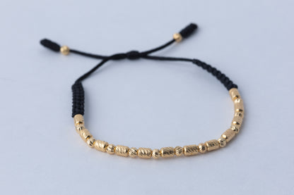 Pulso Tejido balin y barril  Oro 18K
