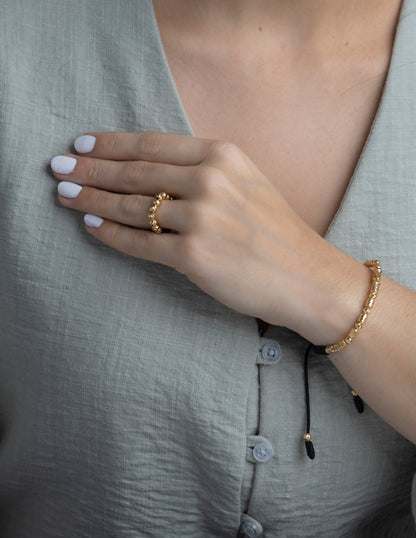 Anillo tejido balin seguido en Oro 18k