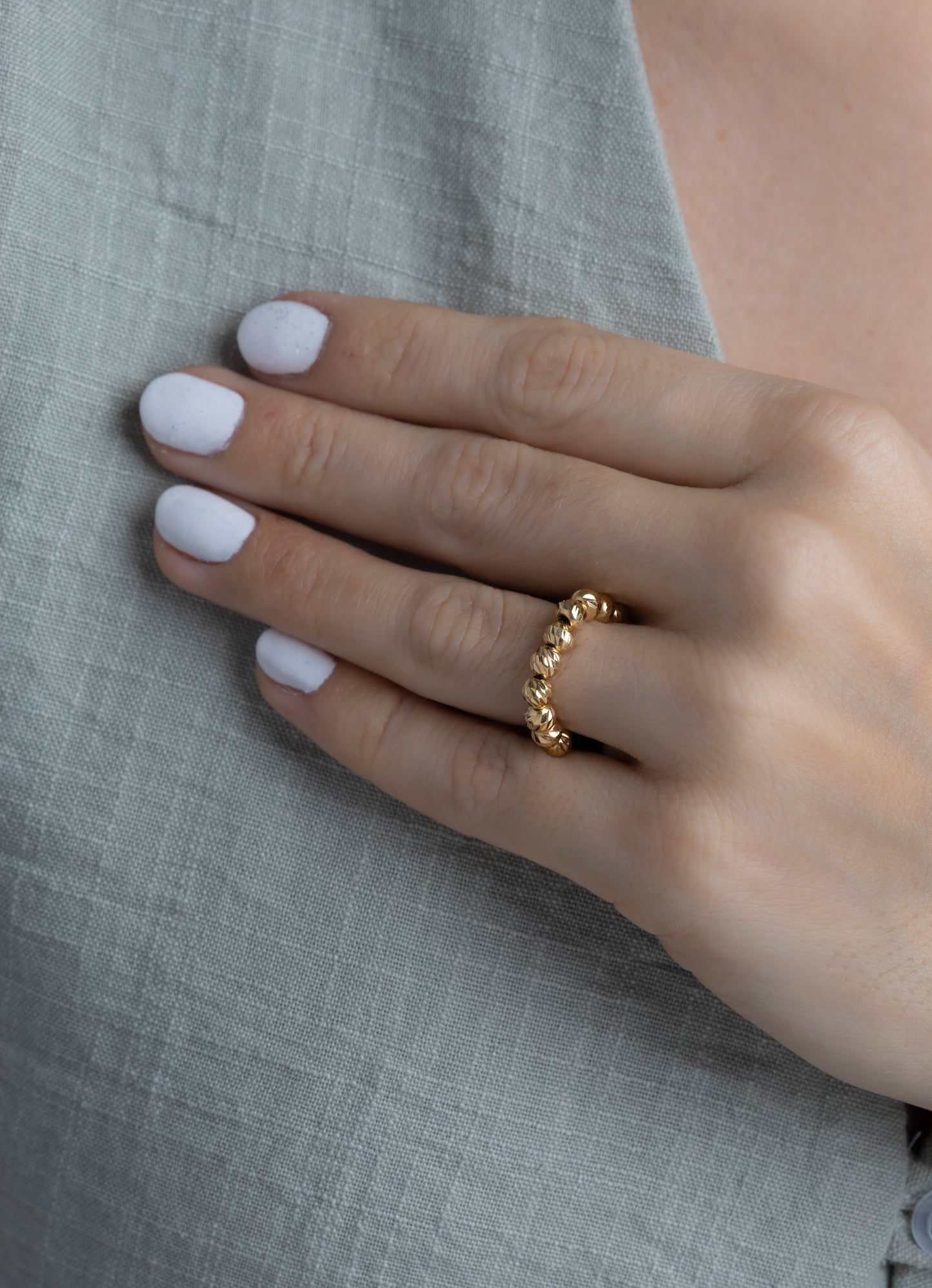 Anillo tejido balin seguido en Oro 18k