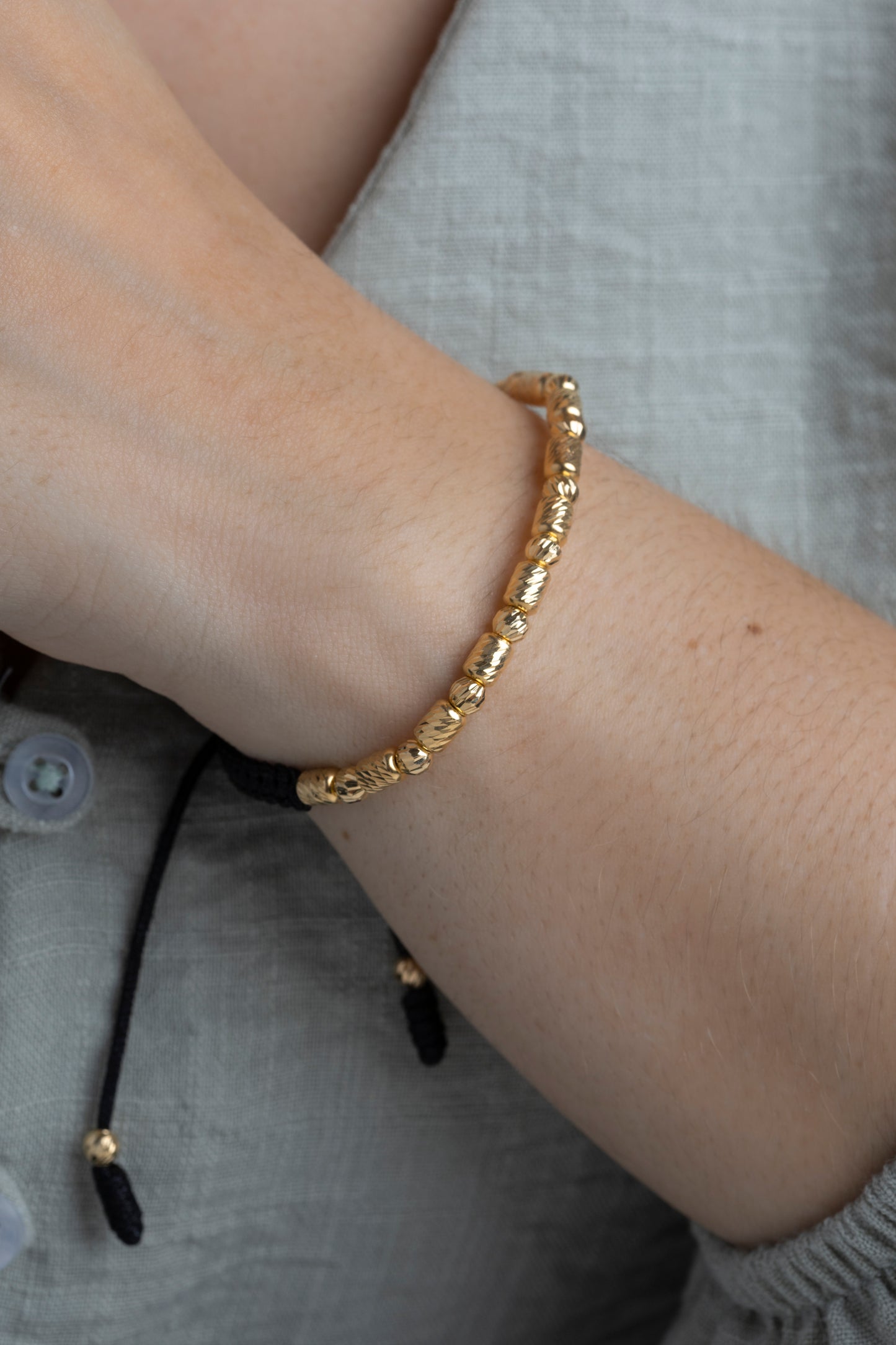 Pulso Tejido balin y barril  Oro 18K