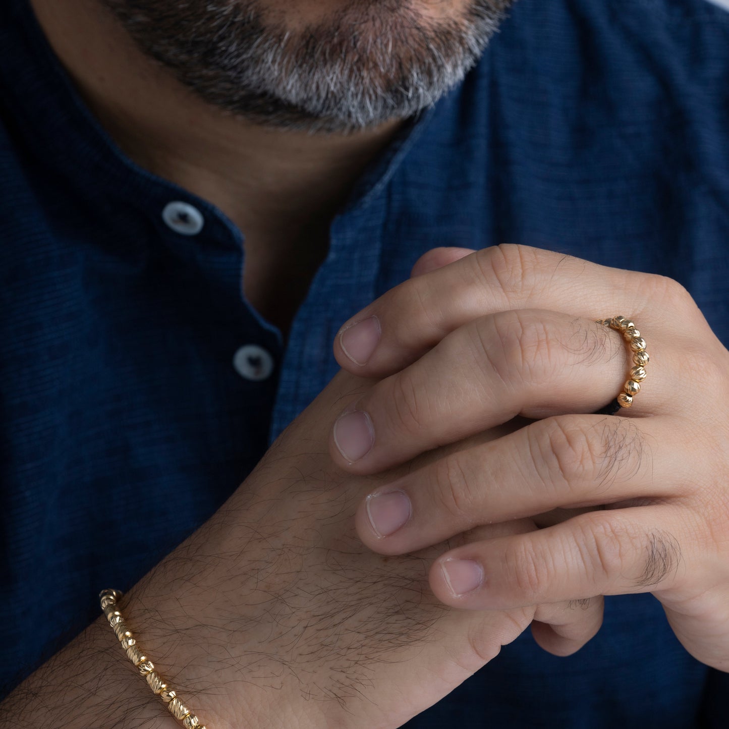 Anillo tejido balin seguido en Oro 18k